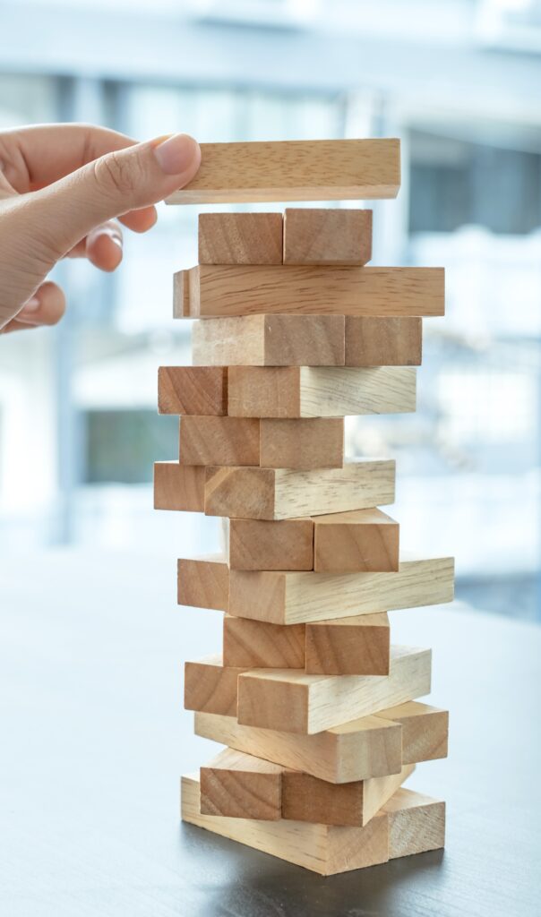 Hand holding blocks wood game